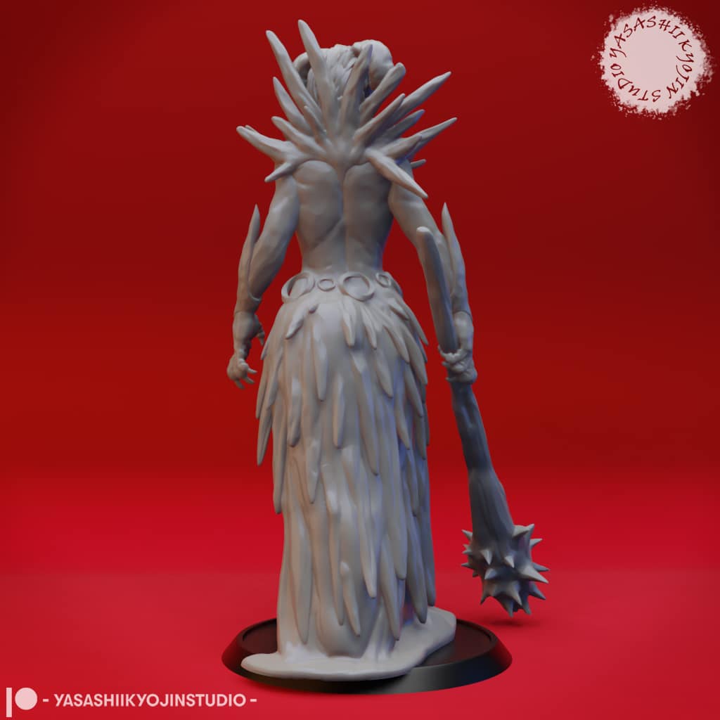 “Auril Crone Form resin miniature by Yasashii Kyojin Studio, featuring a floating hooded figure sculpted in icy draped shapes against a red background.”