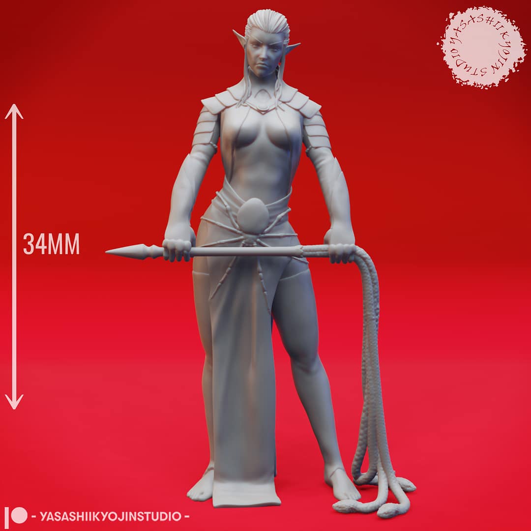 A grayscale resin miniature of a drow elf warrior with long hair, dual curved swords, and layered elven armour