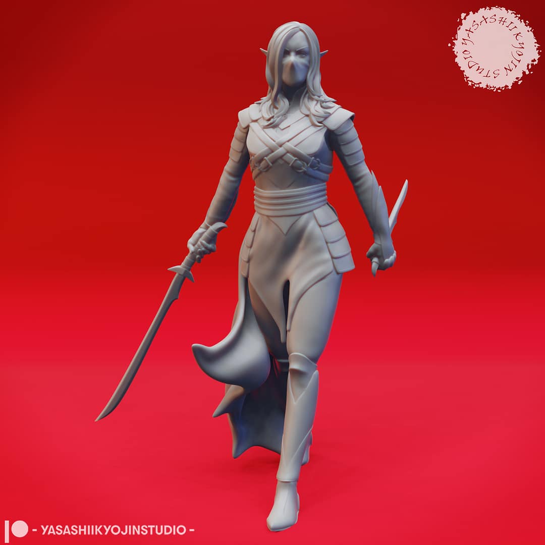 A grayscale resin miniature of a drow elf warrior with long hair, dual curved swords, and layered elven armour