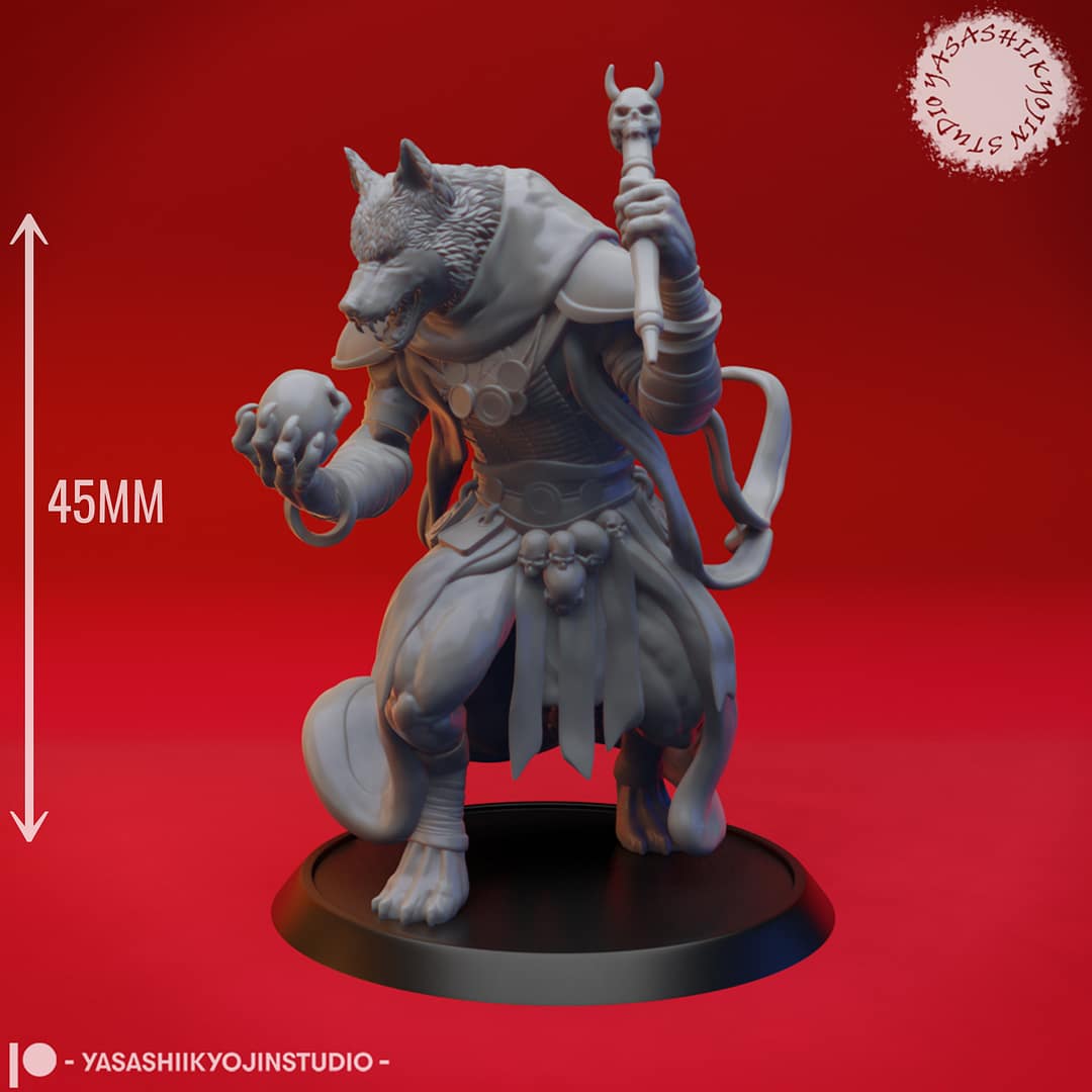 “Coyote Necromancer resin miniature by Yasashii Kyojin Studio, showing a humanoid coyote spellcaster holding a skull and staff on a red background.”
