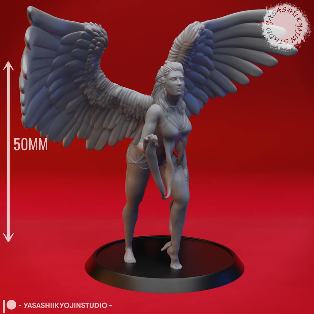 “Deva resin miniature by Yasashii Kyojin Studio, featuring a celestial winged angel warrior with large feathered wings standing on a display base against a red background.”
