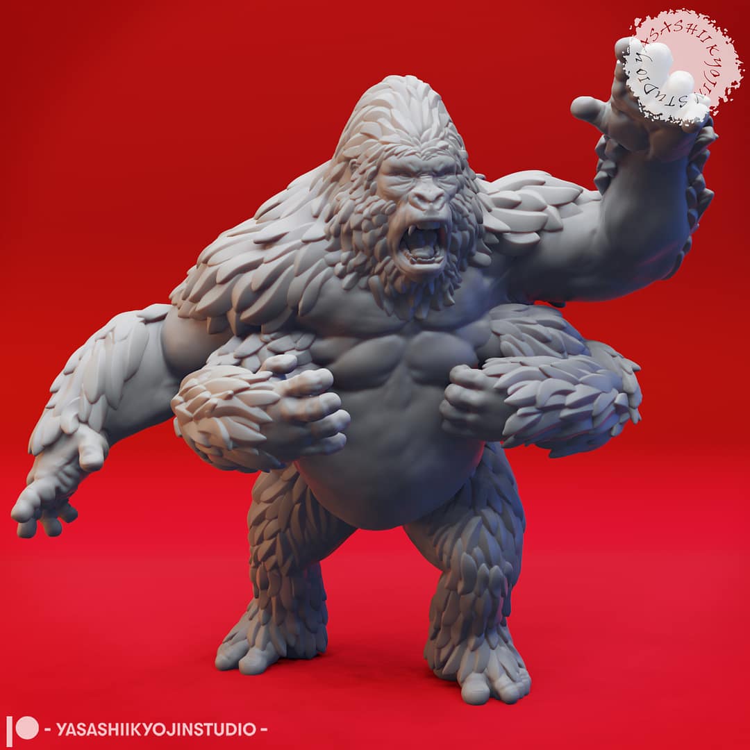 Two resin Girallon miniatures—one standing in an alert pose and one lunging forward in a charging pose—four-armed ape-like beasts sculpted by Yasashii Kyojin Studio and displayed against a red background