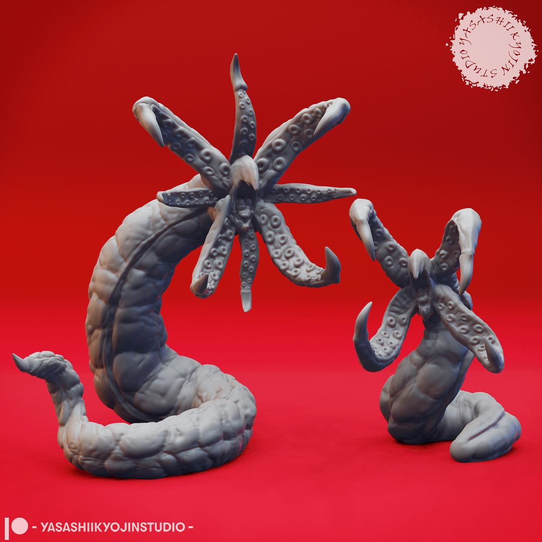 Two Grick resin miniatures—one Alpha and one Beta—featuring serpentine bodies and star-shaped tentacled maws with hooked appendages, sculpted by Yasashii Kyojin Studio and displayed against a red background