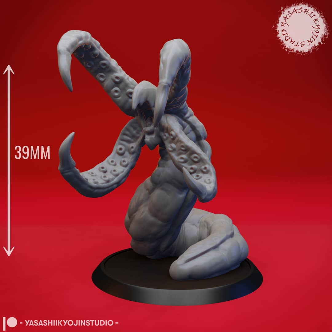Two Grick resin miniatures—one Alpha and one Beta—featuring serpentine bodies and star-shaped tentacled maws with hooked appendages, sculpted by Yasashii Kyojin Studio and displayed against a red background