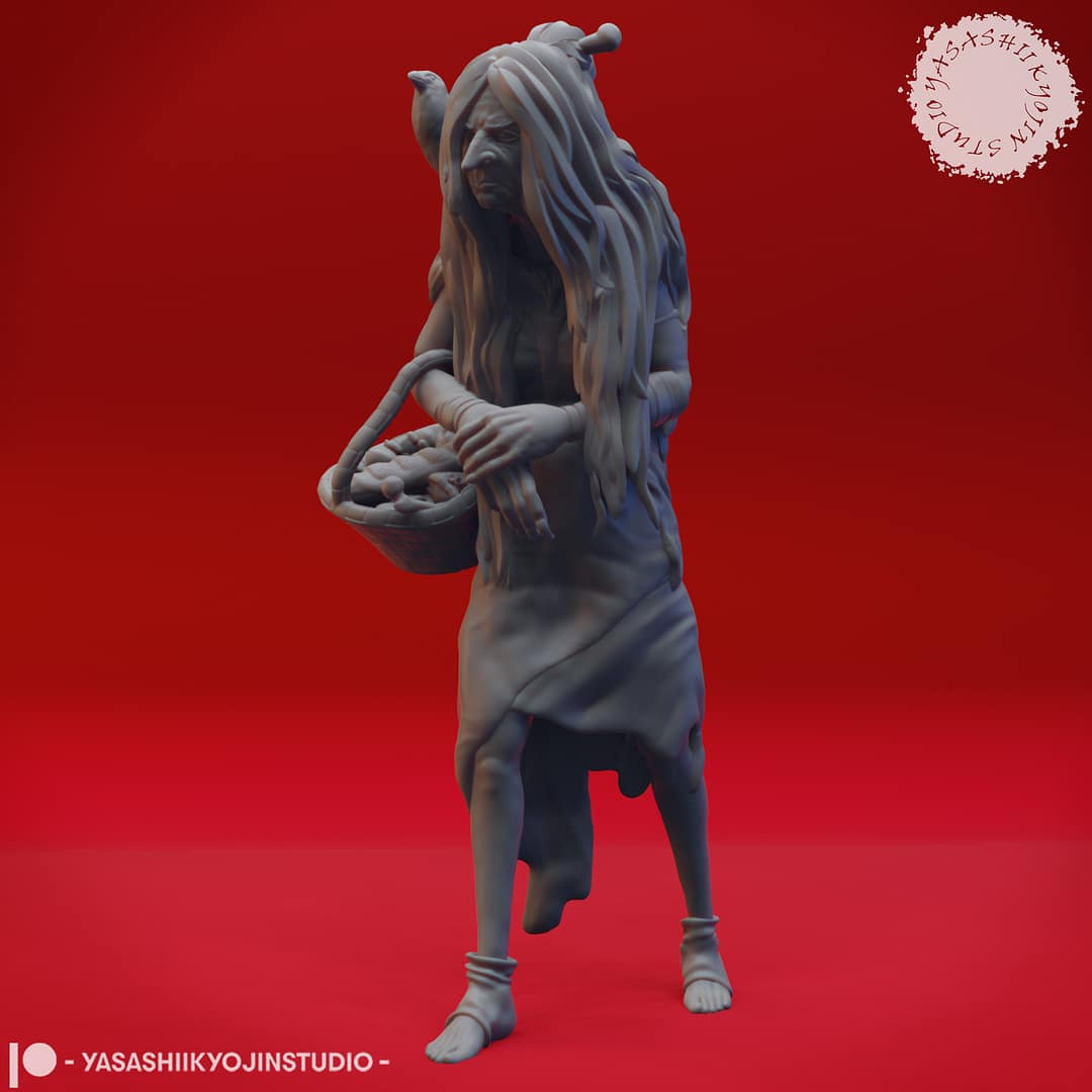 Resin Green Hag miniature featuring a hunched, long-haired crone carrying a woven basket and accompanied by a perched crow, sculpted by Yasashii Kyojin Studio and displayed against a red background