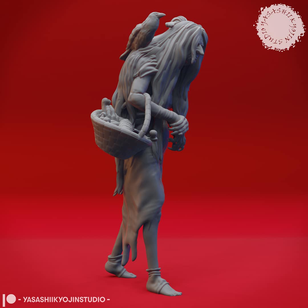 Resin Green Hag miniature featuring a hunched, long-haired crone carrying a woven basket and accompanied by a perched crow, sculpted by Yasashii Kyojin Studio and displayed against a red background