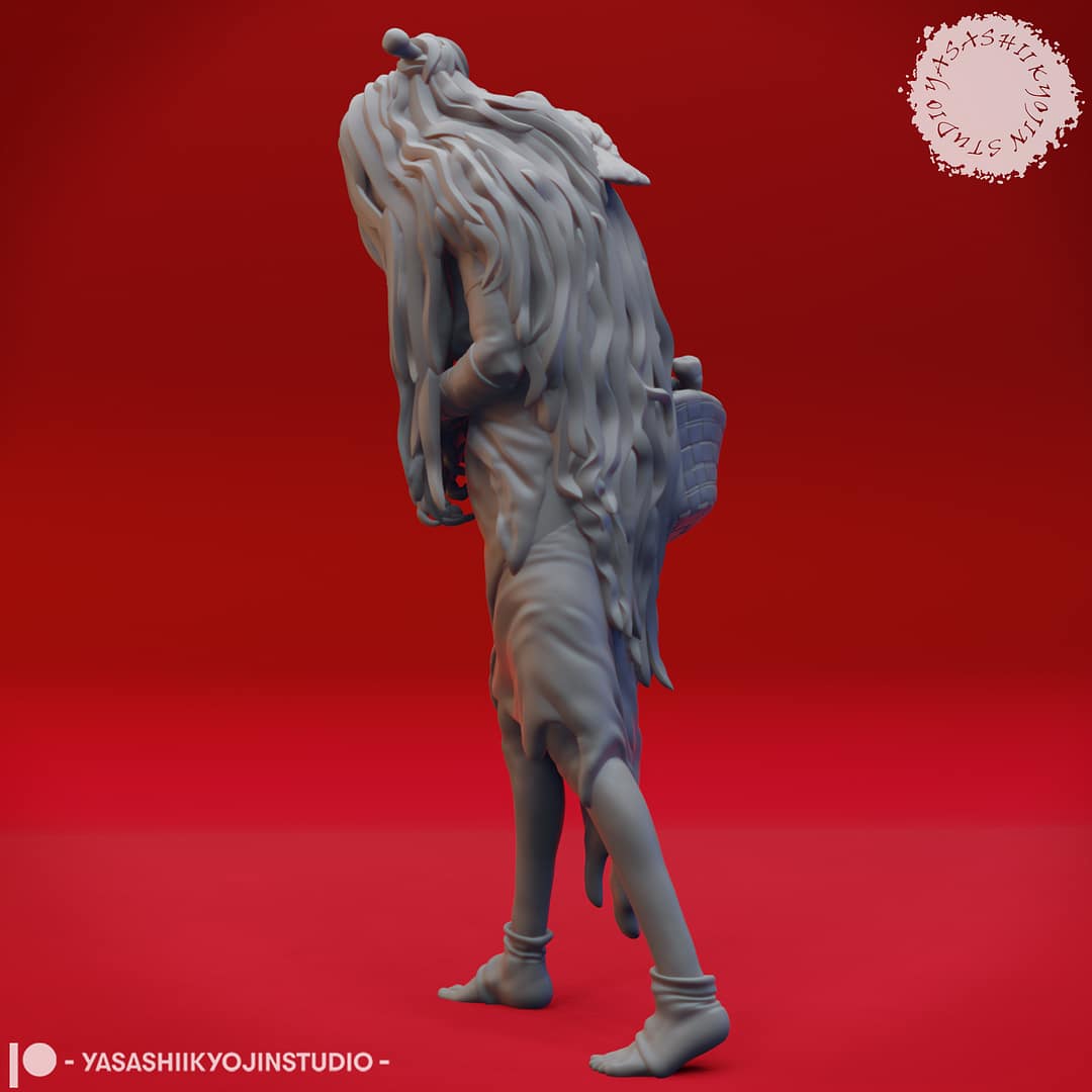 Resin Green Hag miniature featuring a hunched, long-haired crone carrying a woven basket and accompanied by a perched crow, sculpted by Yasashii Kyojin Studio and displayed against a red background