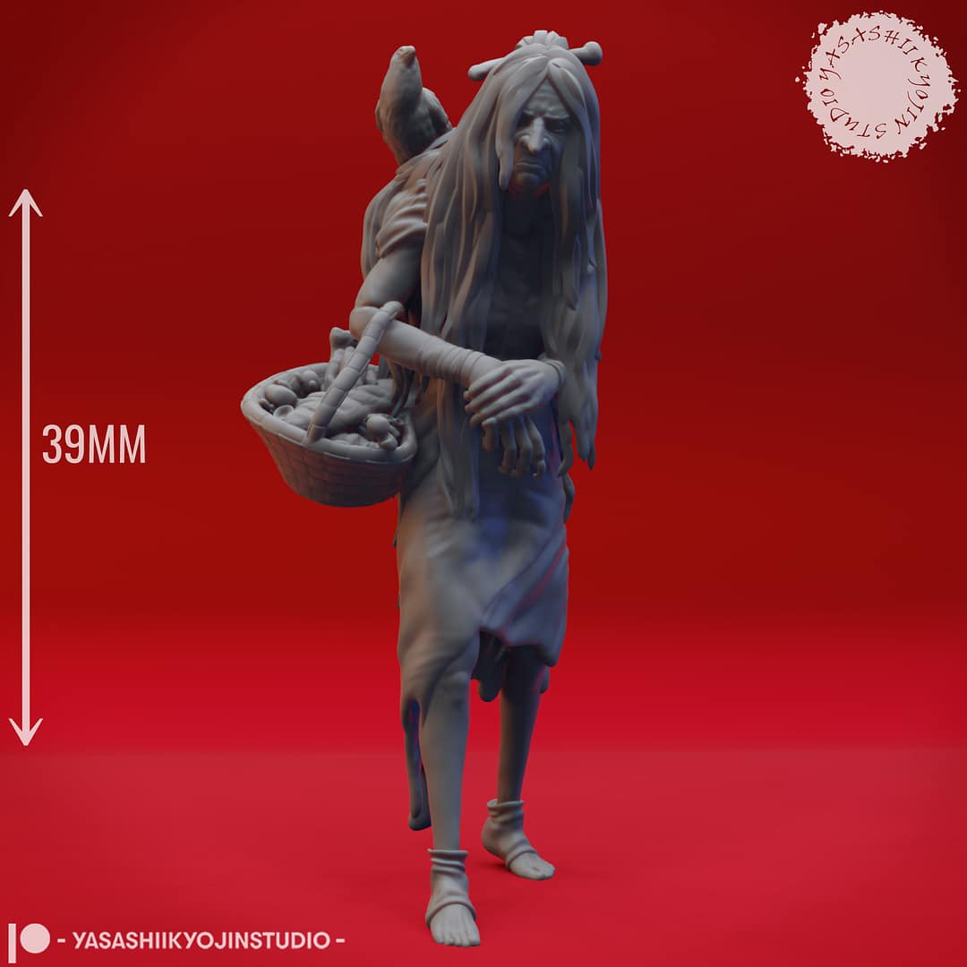 Resin Green Hag miniature featuring a hunched, long-haired crone carrying a woven basket and accompanied by a perched crow, sculpted by Yasashii Kyojin Studio and displayed against a red background