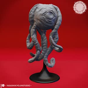 “Death Kiss resin miniature by Yasashii Kyojin Studio, featuring a floating beholderkin aberration with long tentacles displayed on a stand against a red background.”