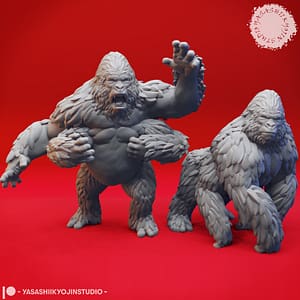 Two resin Girallon miniatures—one standing in an alert pose and one lunging forward in a charging pose—four-armed ape-like beasts sculpted by Yasashii Kyojin Studio and displayed against a red background